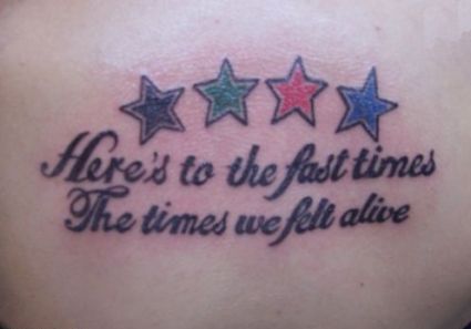 Colorful Stars And Text Tattoo